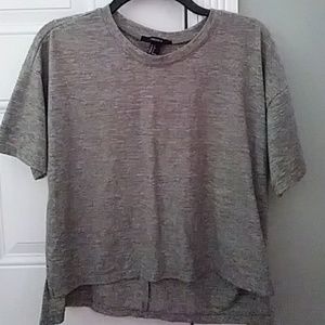 Greenish shirt, mostly in the color gray